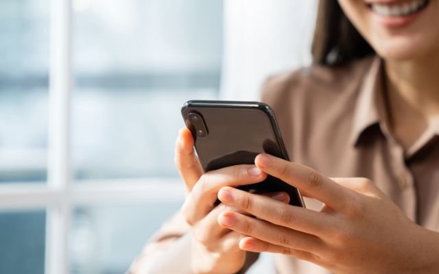 A girl looking into her mobile
